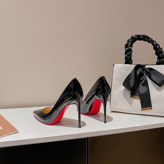 Black shoes with a red base and high heels