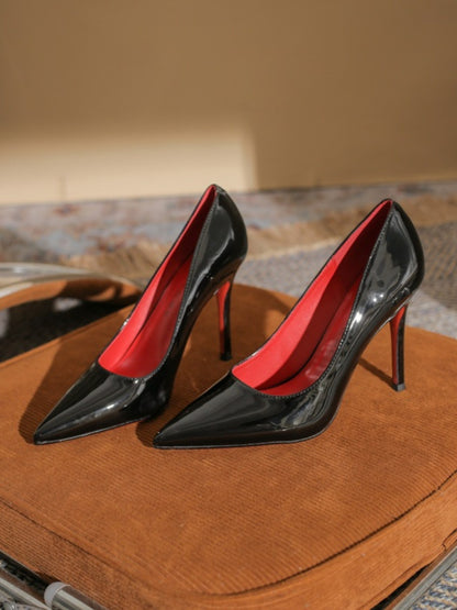 Black shoes with a red base and high heels